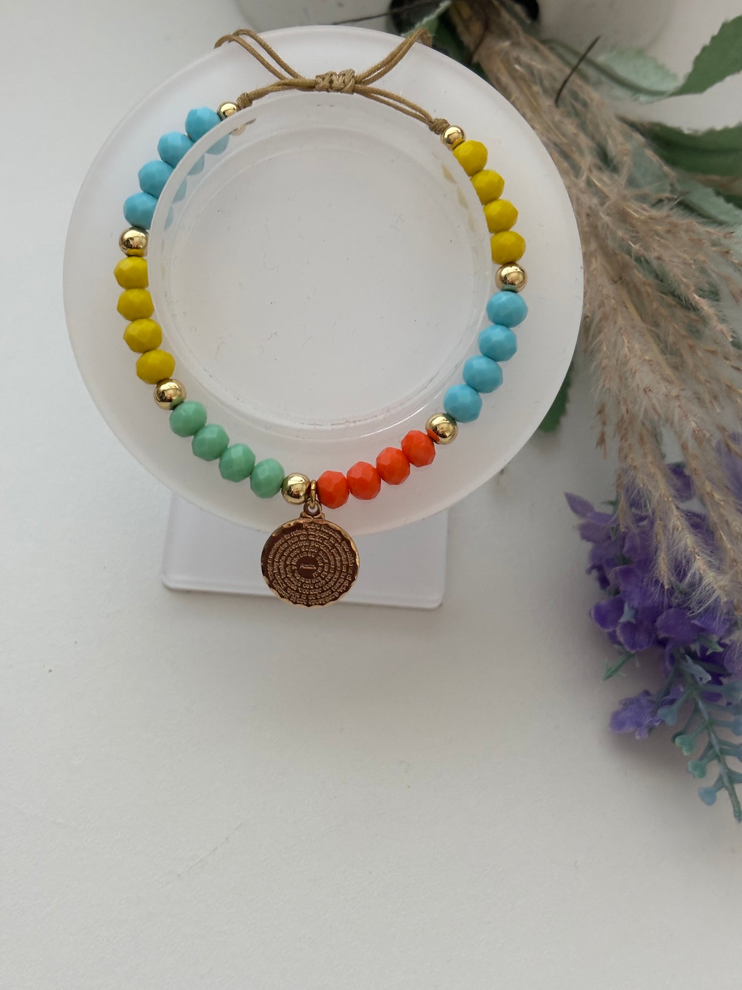 Pulsera con dije del Padre Nuestro