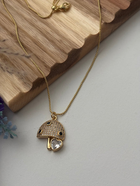 Collar con colgante de hongo brillante